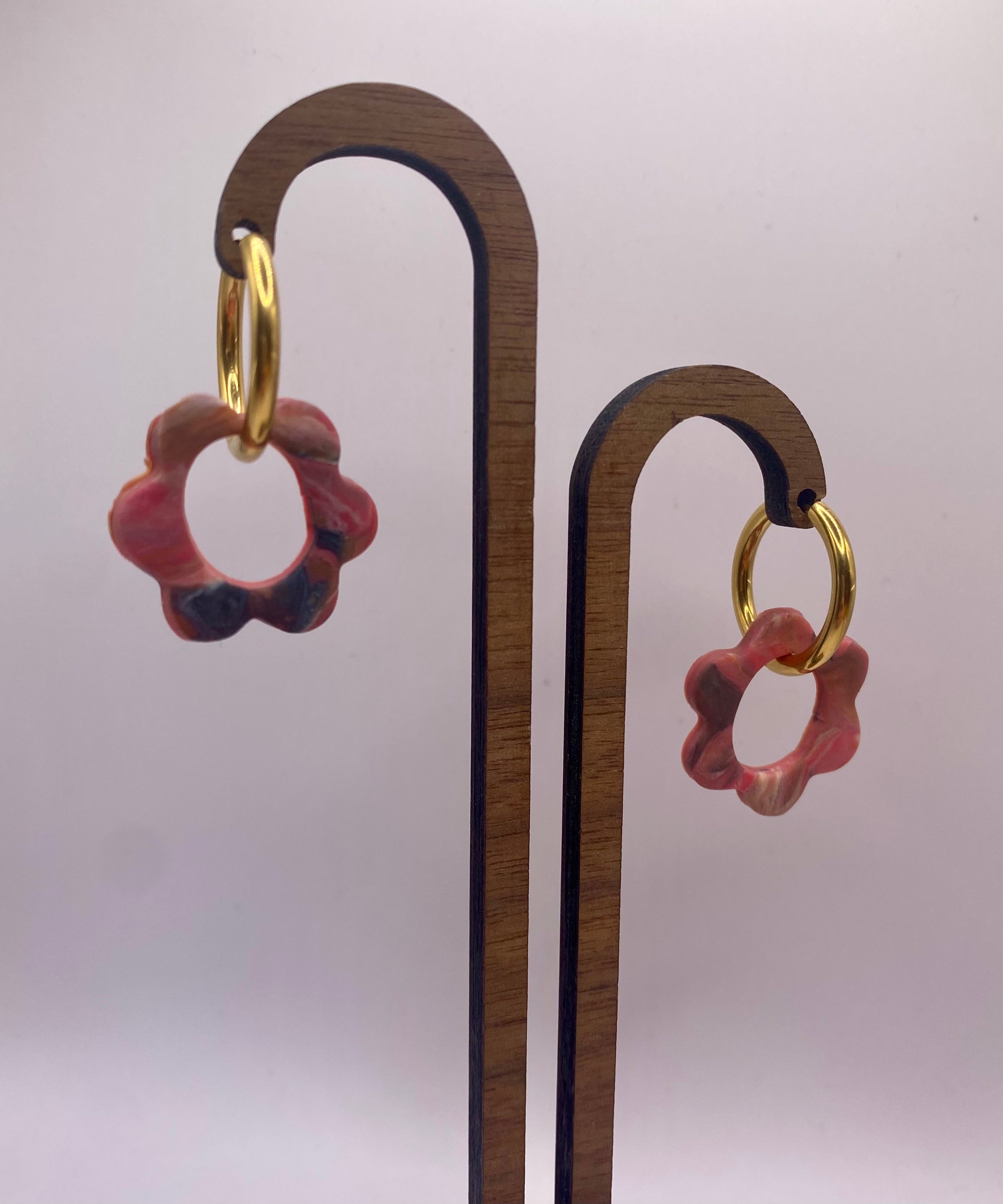 Boucles fleurs roses